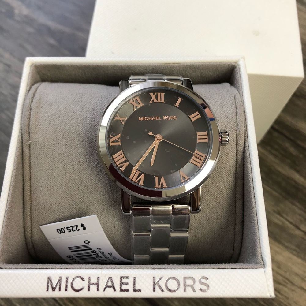 Michael Kors watch, silver with rose gold accents.